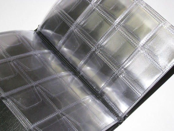 Монетник «Десятка» для монет 110х155 мм, на 96 монеты (12 ячеек 33х33 мм на листе, с клапанами) Монетник «Десятка» для монет 110х155 мм, на 96 монеты (12 ячеек 33х33 мм на листе, с клапанами)